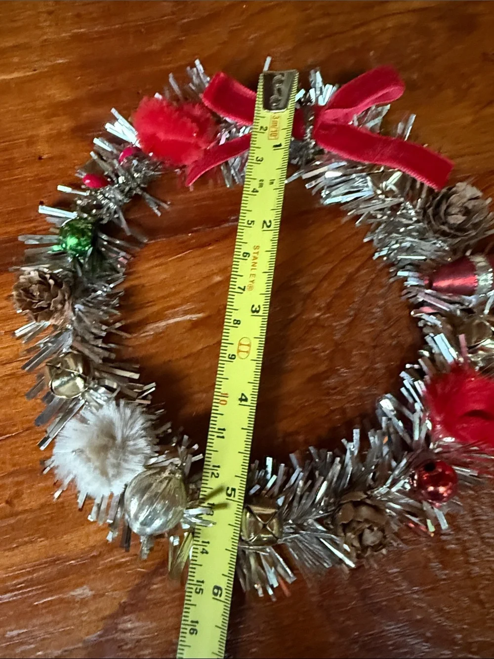 🎄 6” Festive Silver Tinsel Holiday Wreath with Red Bow and Decorative Accents